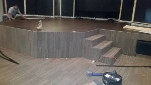 Carpet installation of stage | Shans Carpets And Fine Flooring Inc