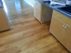 Laminate flooring in kitchen | Shans Carpets And Fine Flooring Inc