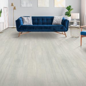 Blue sofa on Laminate floor | Shans Carpets And Fine Flooring Inc